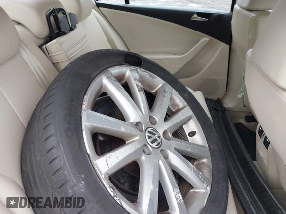 2010 Volkswagen Passat Komfort with VIN WVWJM7AN6AE154387, listed as a IAAI auction lot 42371628 with 145,054 mi miles and . Bid and sale history available at DreamBid. Image 8.