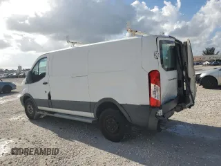2015 Ford Transit Cargo with VIN 1FTNR1ZM8FKA33669, listed as a Copart auction lot 63588345 with 86,260 mi miles and Salvage title. Bid and sale history available at DreamBid. Image 2.
