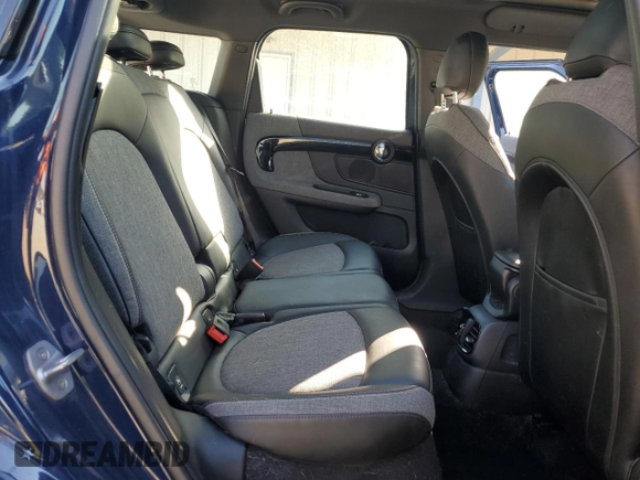 2018 MINI Countryman Cooper S E with VIN WMZYU7C47J3E56451, listed as a Copart auction lot 77193144 with 60,949 mi miles and Salvage Title. Bid and sale history available at carsss.com. Image 10.