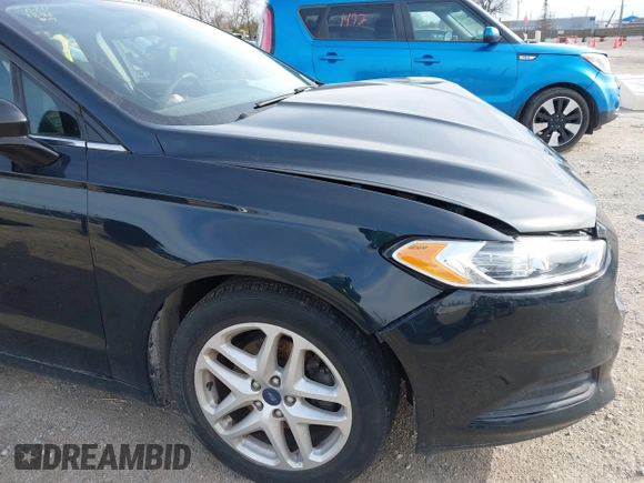2014 Ford Fusion SE with VIN 3FA6P0H72ER156982, listed as a IAAI auction lot 41865154 with 215,319 mi miles and . Bid and sale history available at DreamBid. Image 14.