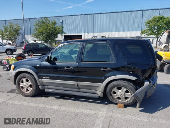 2002 Ford Escape XLT with VIN 1FMCU03142KC39723, listed as a IAAI auction lot 42228038 with 131,399 mi miles and . Bid and sale history available at DreamBid. Image 15.