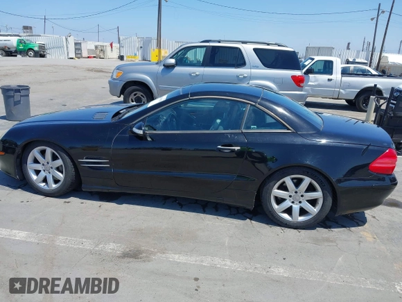 2003 Mercedes-Benz SL 500 with VIN WDBSK75F23F015866, listed as a IAAI auction lot 42415510 with 141,049 mi miles and . Bid and sale history available at DreamBid. Image 13.
