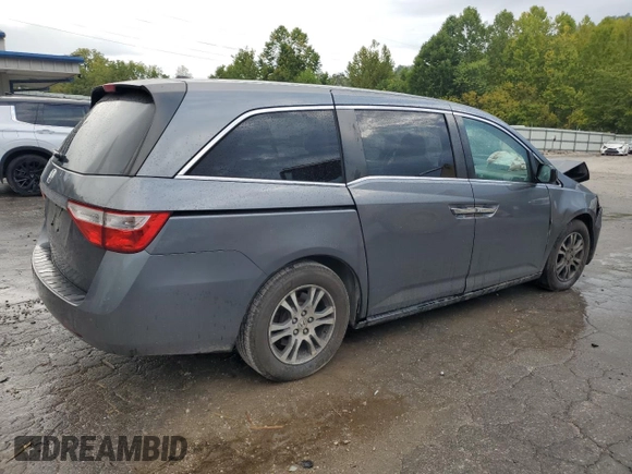 2012 Honda Odyssey EX-L with VIN 5FNRL5H64CB035196, listed as a Copart auction lot 71566704 with 243,529 mi miles and Salvage Title. Bid and sale history available at carsss.com. Image 3.