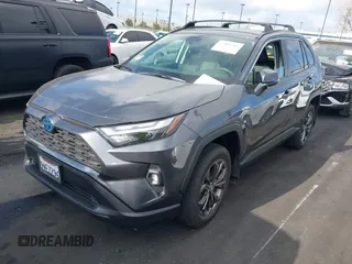 2024 Toyota RAV4 Hybrid XLE Premium with VIN JTMB6RFV2RD138594, listed as a IAAI auction lot 41885310 with 12,330 mi miles. Bid and sale history available at carsss.com. Image 2.