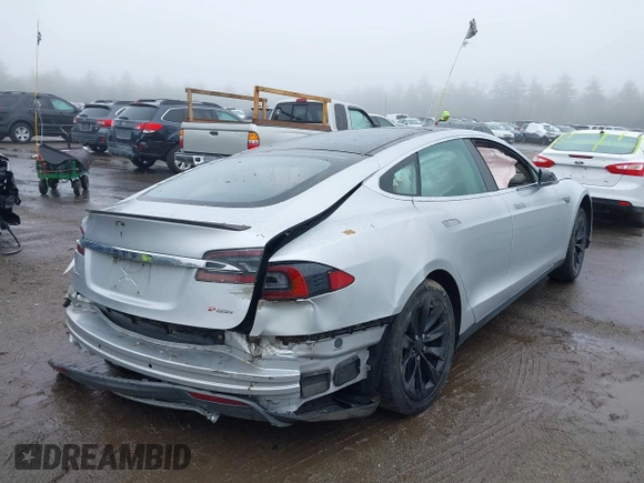 2014 Tesla Model S 60 with VIN 5YJSA1H18EFP30143, listed as a IAAI auction lot 42190505 with Not provided miles and . Bid and sale history available at DreamBid. Image 4.