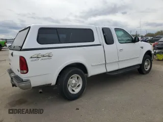 1998 Ford F-150 with VIN 1FTZX18W5WKB91459, listed as a Copart auction lot 52369095 with 185,660 mi miles and Salvage title. Bid and sale history available at DreamBid. Image 3.