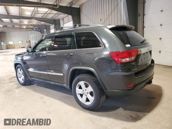 2011 Jeep Grand Cherokee Laredo with VIN 1J4RS4GG9BC517059, listed as a Copart auction lot 52704705 with 120,171 mi miles and Salvage Title. Bid and sale history available at DreamBid. Image 2.