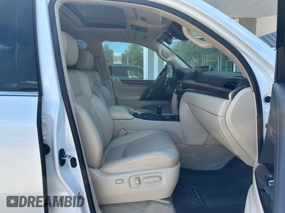 2017 Lexus LX 570 z VIN JTJHY7AX7H4243757, wystawiony jako Copart lot #66006545 z przebiegiem 94 422 mil mil oraz Czysty tytuł • Clean title. Historia ofert i sprzedaży dostępna na DreamBid. Obrazek 5.