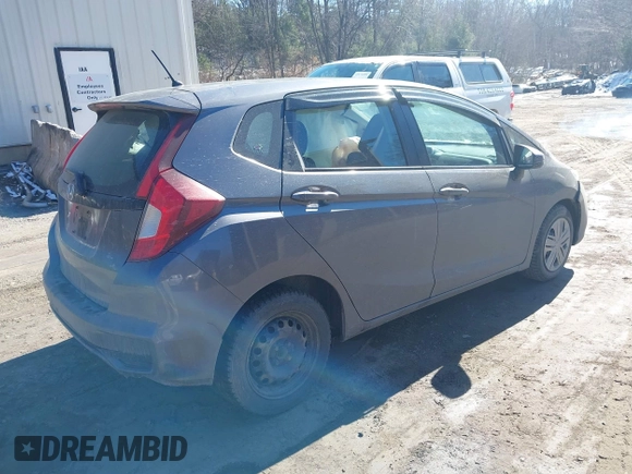 2018 Honda Fit LX z VIN 3HGGK5G44JM716592, wystawiony jako IAAI lot #41878820 z przebiegiem 70 464 mil mil oraz . Historia ofert i sprzedaży dostępna na DreamBid. Obrazek 4.