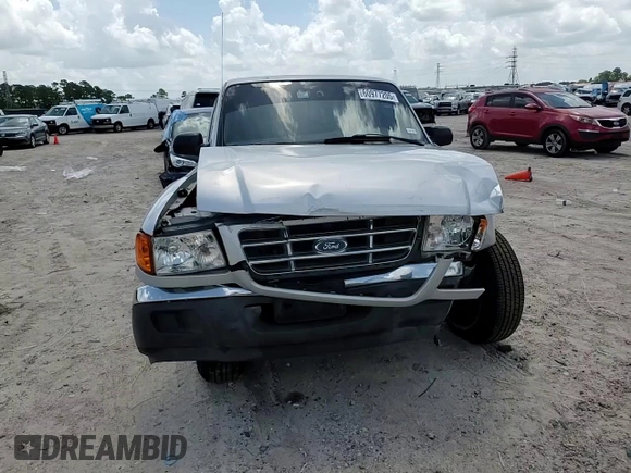 2001 Ford Ranger XL with VIN 1FTYR14V01PB46542, listed as a Copart auction lot 60977205 with 230,933 mi miles and Salvage title. Bid and sale history available at DreamBid. Image 13.