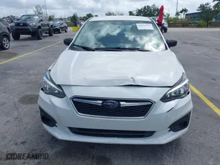 2018 Subaru Impreza with VIN 4S3GKAA68J3609404, listed as a IAAI auction lot 41954733 with 214,560 mi miles. Bid and sale history available at carsss.com. Image 6.