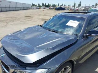 2015 BMW 4 Series 428i with VIN WBA4A5C59FG052596, listed as a IAAI auction lot 42649927 with 68,842 mi miles and . Bid and sale history available at DreamBid. Image 6.
