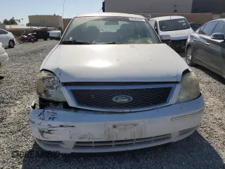 2006 Ford Ocean z VIN 1FAHP23106G163977, wystawiony jako Copart lot #63364034 z przebiegiem 288 399 mil mil oraz Szkody całkowita. Historia ofert i sprzedaży dostępna na DreamBid. Obrazek 5.
