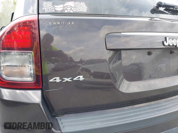 2014 Jeep Compass Latitude with VIN 1C4NJDEBXED622352, listed as a IAAI auction lot 42130403 with 149,024 mi miles. Bid and sale history available at carsss.com. Image 13.