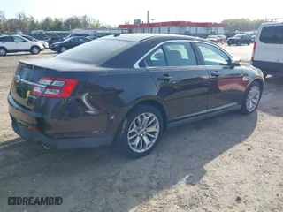 2013 Ford Taurus Limited with VIN 1FAHP2F85DG188511, listed as a IAAI auction lot 42077614 with 165,059 mi miles. Bid and sale history available at carsss.com. Image 4.