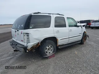 2003 GMC Yukon SLT with VIN 1GKEK13V23J300767, listed as a IAAI auction lot 41691632 with 251,849 mi miles. Bid and sale history available at carsss.com. Image 4.