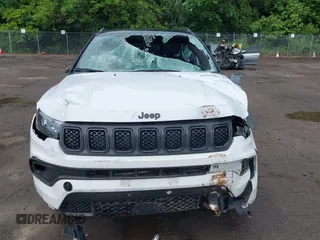 2023 Jeep Compass Latitude with VIN 3C4NJDBN3PT510424, listed as a IAAI auction lot 42385491 with 58,640 mi miles and . Bid and sale history available at DreamBid. Image 12.