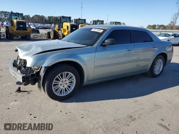 2005 Chrysler 300 with VIN 2C3JA43R95H168570, listed as a Copart auction lot 87672695 with 82,171 mi miles and Salvage Title. Bid and sale history available at carsss.com. Image 1.