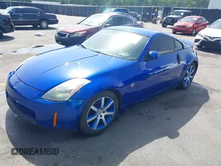 2004 Nissan 350Z Enthusiast z VIN JN1AZ34D34T150619, wystawiony jako IAAI lot #42248408 z przebiegiem 276 869 mil mil oraz . Historia ofert i sprzedaży dostępna na DreamBid. Obrazek 2.
