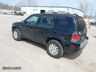 2005 Mercury Mariner Luxury with VIN 4M2CU57115DJ19408, listed as a IAAI auction lot 42060685 with 204,744 mi miles. Bid and sale history available at carsss.com. Image 3.