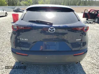 2021 Mazda CX-30 Select z VIN 3MVDMABL2MM232281, wystawiony jako Copart lot #51098235 z przebiegiem 46 052 mil mil oraz Nie do naprawy • Non repairable. Historia ofert i sprzedaży dostępna na DreamBid. Obrazek 6.