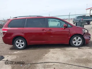 2014 Toyota Sienna LE AAS with VIN 5TDKK3DC4ES462090, listed as a IAAI auction lot 41942354 with 215,814 mi miles. Bid and sale history available at carsss.com. Image 13.