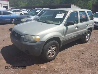 2005 Ford Escape XLS Value with VIN 1FMYU02Z25KB13278, listed as a IAAI auction lot 41981861 with 173,733 mi miles. Bid and sale history available at carsss.com. Image 2.
