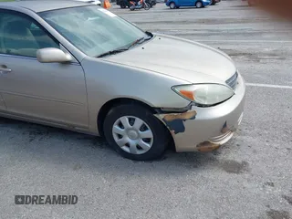 2003 Toyota Camry LE with VIN 4T1BE32K13U243738, listed as a IAAI auction lot 42120647 with Not Provided miles and . Bid and sale history available at DreamBid. Image 12.