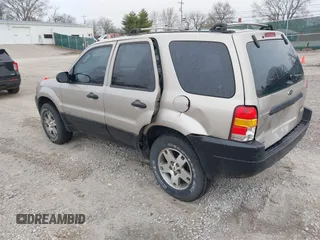 2001 Ford Escape with VIN 1FMUU01B61KE00524, listed as a IAAI auction lot 41486950 with 163,753 mi miles and . Bid and sale history available at DreamBid. Image 3.