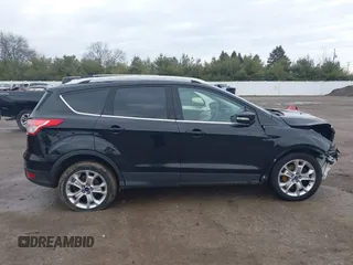 2016 Ford Escape Titanium with VIN 1FMCU0J91GUC69895, listed as a IAAI auction lot 41488171 with 162,232 mi miles. Bid and sale history available at carsss.com. Image 14.