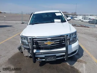 2020 Chevrolet Tahoe Commercial with VIN 1GNSKDEC5LR261015, listed as a IAAI auction lot 42001083 with 110,668 mi miles. Bid and sale history available at carsss.com. Image 12.
