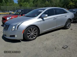 2013 Cadillac XTS Luxury z VIN 2G61P5S3XD9189744, wystawiony jako Copart lot #54391535 z przebiegiem 132 841 mil mil oraz Szkoda całkowita • Salvage title. Historia ofert i sprzedaży dostępna na DreamBid. Obrazek 1.