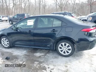 2023 Toyota Corolla Hybrid LE with VIN JTDBDMHE7P3004396, listed as a IAAI auction lot 41606222 with 15,037 mi miles. Bid and sale history available at carsss.com. Image 14.