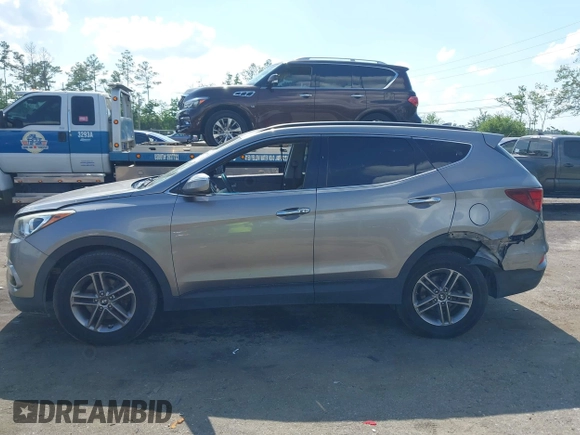 2017 Hyundai Santa Fe 2.4L z VIN 5NMZU3LB7HH025791, wystawiony jako IAAI lot #42277964 z przebiegiem 154 110 mil mil oraz . Historia ofert i sprzedaży dostępna na DreamBid. Obrazek 14.