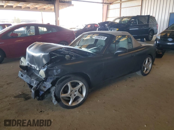 2003 Mazda MX-5 Miata Cloth with VIN JM1NB353730303334, listed as a Copart auction lot 51692615 with 142,789 mi miles and Salvage title. Bid and sale history available at DreamBid. Image 1.