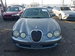 2003 Jaguar S-Type with VIN SAJEA01T23FM93839, listed as a IAAI auction lot 41891973 with 153,761 mi miles and . Bid and sale history available at DreamBid. Image 12.