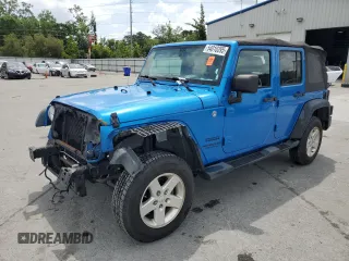 2015 Jeep Wrangler Unlimited Willys Wheeler with VIN 1C4BJWDG4FL611656, listed as a Copart auction lot 54010395 with 129,797 mi miles and Salvage Title. Bid and sale history available at DreamBid. Image 1.