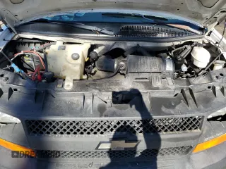 2005 Chevrolet Express Cargo z VIN 1GCFG15X751112877, wystawiony jako Copart lot #77494014 z przebiegiem 349 555 mil mil oraz Czysty tytuł • Clean title. Historia ofert i sprzedaży dostępna na DreamBid. Obrazek 12.