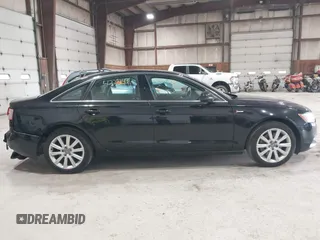 2013 Audi A6 Premium Plus z VIN WAUGGAFC1DN093411, wystawiony jako IAAI lot #42281491 z przebiegiem 138 135 mil mil oraz . Historia ofert i sprzedaży dostępna na DreamBid. Obrazek 13.