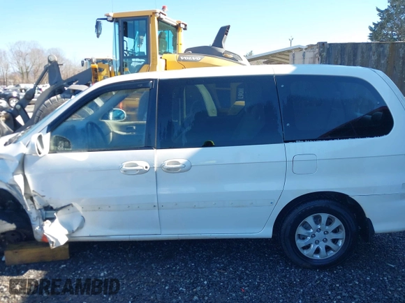 2004 Kia Sedona LX with VIN KNDUP131046577380, listed as a IAAI auction lot 41468710 with 138,451 mi miles and . Bid and sale history available at DreamBid. Image 14.