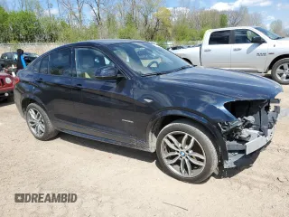2016 BMW X4 xDrive28i with VIN 5UXXW3C55G0R22374, listed as a Copart auction lot 52823304 with 72,382 mi miles. Bid and sale history available at carsss.com. Image 4.
