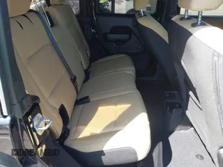 2018 Jeep Wrangler Unlimited Sport with VIN 1C4HJXDN3JW198375, listed as a IAAI auction lot 41965568 with 106,418 mi miles and . Bid and sale history available at DreamBid. Image 8.