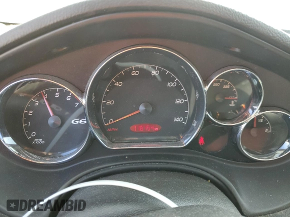 2008 Pontiac G6 z VIN 1G2ZG57N184198212, wystawiony jako Copart lot #70977674 z przebiegiem 118 154 mil mil oraz Czysty tytuł • Clean title. Historia ofert i sprzedaży dostępna na DreamBid. Obrazek 9.
