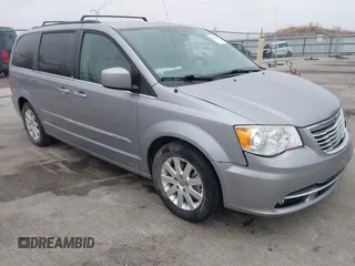 2014 Chrysler Town & Country Touring z VIN 2C4RC1BG1ER225443, wystawiony jako IAAI lot #42057326 z przebiegiem 142 997 mil mil oraz . Historia ofert i sprzedaży dostępna na DreamBid. Obrazek 1.