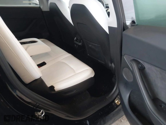 2023 Tesla Model Y Long Range with VIN 7SAYGAEEXPF707503, listed as a IAAI auction lot 41712166 with 27,467 mi miles and . Bid and sale history available at carsss.com. Image 8.