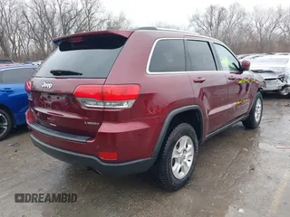 2017 Jeep Grand Cherokee Laredo with VIN 1C4RJFAG2HC682716, listed as a IAAI auction lot 41213760 with 116,519 mi miles. Bid and sale history available at carsss.com. Image 4.