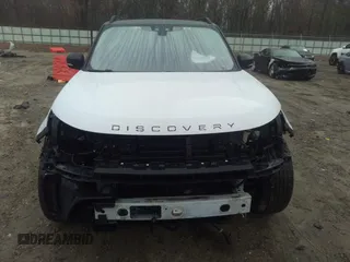 2018 Land Rover Discovery HSE Luxury z VIN SALRT2RV3JA057709, wystawiony jako IAAI lot #41563821 z przebiegiem 99 639 mil mil oraz . Historia ofert i sprzedaży dostępna na DreamBid. Obrazek 6.