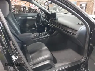 2023 Honda Civic Sport with VIN 2HGFE2F52PH505538, listed as a IAAI auction lot 42447559 with 36,621 mi miles and . Bid and sale history available at DreamBid. Image 5.