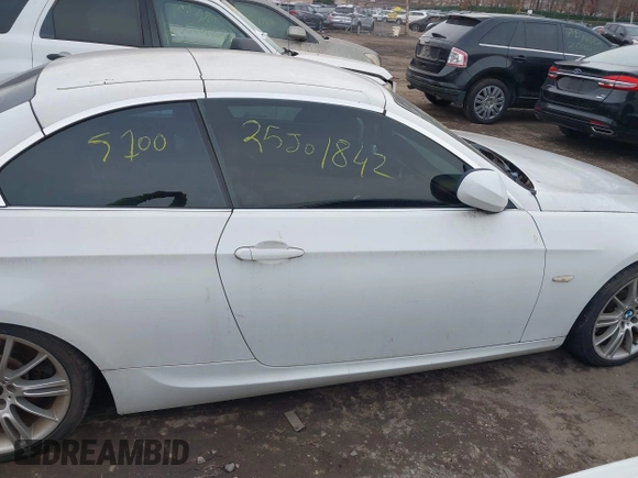 2011 BMW 3 Series 335i with VIN WBADX7C51BE742780, listed as a IAAI auction lot 41636961 with Not Provided miles and . Bid and sale history available at carsss.com. Image 12.