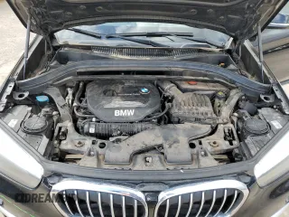 2018 BMW X1 xDrive28i with VIN WBXHT3C32J5L28030, listed as a Copart auction lot 47087415 with 100,708 mi miles and Salvage Title. Bid and sale history available at carsss.com. Image 12.